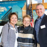 Lynn M. Blue posing with guests at the Lynn M. Blue Connection Naming Ceremony